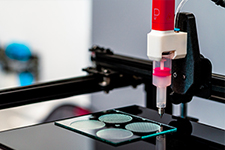 Print heads for extrusion-based bioprinting